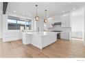 Spacious kitchen featuring a large island and modern appliances at 2125 Vine Ave, Boulder, CO 80304
