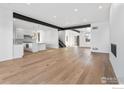 Bright and airy living room with hardwood floors and large windows at 2125 Vine Ave, Boulder, CO 80304