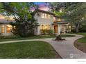 Beautiful two-story home with a welcoming front porch at 2210 Meadow Ave, Boulder, CO 80304