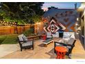 Outdoor patio with seating area, mural, and grill at 2345 South St, Boulder, CO 80302