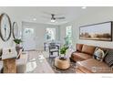 Bright living room with L-shaped sofa and stylish decor at 241 Gay St, Longmont, CO 80501