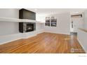 Inviting living room with a sleek fireplace and natural light at 33 Garfield St, Denver, CO 80206