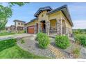 Attractive ranch home with stone accents and a covered porch at 365 Casalon Pl, Superior, CO 80027