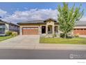 One-story home with a two-car garage and well-manicured lawn at 365 Casalon Pl, Superior, CO 80027