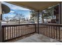 Private patio with a view of the parking lot at 7820 W 87Th Dr # K, Arvada, CO 80005