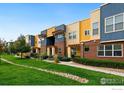 Modern townhouses with landscaped grounds at 11310 Colony Cir, Broomfield, CO 80021