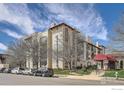 Spanish Towers building exterior, featuring architectural details and landscaping at 805 29Th St # 405, Boulder, CO 80303