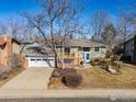 This home offers a spacious layout and a convenient two-car garage, all in a desirable neighborhood at 1631 Centaur Cir, Lafayette, CO 80026