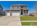 Two-story house with attached garage, new construction at 1950 Mount Monroe Dr, Berthoud, CO 80513