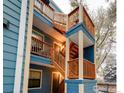 Condo exterior with snowy staircases leading to multiple units, showcasing outdoor living at 3025 Broadway St # 40, Boulder, CO 80304