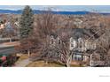 Charming two-story home with mature trees and mountain views at 4101 W 111Th Cir, Westminster, CO 80031