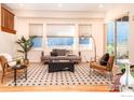 Bright living room featuring comfortable seating and large windows at 5065 3Rd St, Boulder, CO 80304