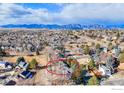 Aerial view of the home, with a view of the mountains in the distance at 538 W Spruce Way, Louisville, CO 80027