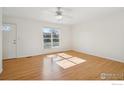 Bright living room featuring hardwood floors and large windows at 965 W Willow St, Louisville, CO 80027