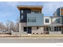 Contemporary multi-story home featuring a mix of textures and a flat roof design at 2160 Folsom St, Boulder, CO 80302