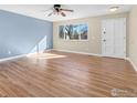Bright living room with natural light and hardwood floors at 18931 E Brunswick Pl, Aurora, CO 80013