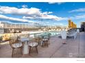Chic rooftop lounge area with comfortable seating and panoramic views overlooking the pool at 3701 Arapahoe Ave # 318, Boulder, CO 80303