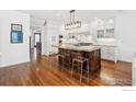 Open kitchen featuring a large island, stainless steel appliances, and ample counter space at 3835 Norwood Ct, Boulder, CO 80304