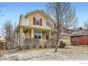 Inviting two-story home with a cozy front porch, perfect for enjoying quiet evenings at 1157 Mircos St, Erie, CO 80516