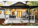 Charming covered patio with dining and seating areas, perfect for outdoor entertaining and relaxing at 1385 Kalmia Ave, Boulder, CO 80304