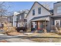 Charming home with an eye-catching orange front door at 4464 N Raleigh St, Denver, CO 80212