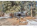 Well-maintained single-story home with mature trees, and a circular driveway at 4862 Silver Sage Ct, Boulder, CO 80301