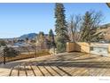 A spacious deck offers stunning mountain views and outdoor entertaining space at 864 Iris Ave, Boulder, CO 80304