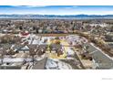 Overhead view of property showcasing surrounding neighborhood and mountain views at 1737 Grove Ct, Longmont, CO 80501