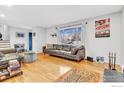 Spacious living room with hardwood floors and a comfortable couch at 4493 Hamilton Ct, Boulder, CO 80305