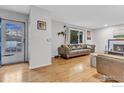 A living room with hardwood floors and lots of sunlight at 4493 Hamilton Ct, Boulder, CO 80305