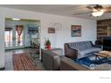 Comfortable living room featuring modern furnishings and stylish decor at 830 10Th St, Berthoud, CO 80513