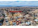 Bird's-eye view showcases the townhome's location near Thompson Park, outlined in red at 409 Terry St # A, Longmont, CO 80501