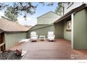 Relaxing outdoor deck area with comfortable seating, ideal for enjoying the outdoors at 4482 Greenbriar Blvd, Boulder, CO 80305