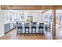Modern kitchen with a large center island, stainless steel appliances, and pendant lighting at 730 Evergreen Ave, Boulder, CO 80304
