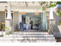 Inviting covered patio featuring comfortable seating and seamless indoor-outdoor flow at 730 Evergreen Ave, Boulder, CO 80304