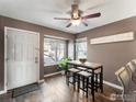 Inviting dining area with a view, showcasing natural light and a cozy atmosphere at 1818 S Quebec Way # 3-1, Denver, CO 80231