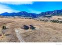 Beautiful home on acreage with mountain views in the background at 4702 Eldorado Springs Dr, Boulder, CO 80303