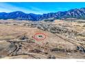 Single Gathering home with circular marking for location on a large, grassy lot at 4702 Eldorado Springs Dr, Boulder, CO 80303