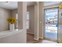 Open entryway leading to the front door and a view of the neighborhood at 5126 Mt Buchanan Ave, Frederick, CO 80504