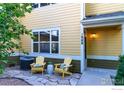 Cozy front porch featuring comfortable seating, creating an inviting outdoor space at 635 Gooseberry Dr # 1908, Longmont, CO 80503