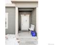 Cozy front porch with seating, offering a welcoming entrance to the home at 897 Winding Brook Dr, Berthoud, CO 80513