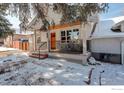 Inviting covered front porch showcasing a seating area, perfect for enjoying the outdoors in any weather at 941 8Th St, Boulder, CO 80302