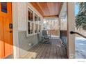 Cozy front porch featuring a wooden ceiling, outdoor seating, and protective railings for added comfort at 941 8Th St, Boulder, CO 80302