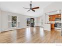 Bright living room featuring hardwood floors, abundant natural light, and an open floor plan, perfect for entertaining at 195 S Cleveland Ave, Louisville, CO 80027