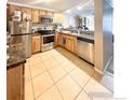 Efficient kitchen featuring stainless steel appliances and light wood cabinetry at 805 29Th St # 204, Boulder, CO 80303