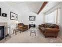 Inviting living room with a fireplace and comfortable furniture at 5520 Stonewall Pl # 31, Boulder, CO 80303