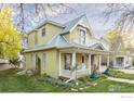 View of a charming two-story home with a well-maintained lawn and landscaping, showcasing the home's exterior at 921 Maxwell Ave # 18, Boulder, CO 80304