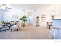 Inviting living room featuring dining and kitchen area at 3100 Blue Sky Cir # 205, Erie, CO 80516