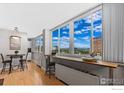 A bright dining area with expansive windows and great city views at 1196 N Grant St # 710, Denver, CO 80203