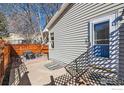 Back entrance of home with a door leading to the cozy patio for outdoor relaxation and activities at 1215 Monarch Dr, Longmont, CO 80504